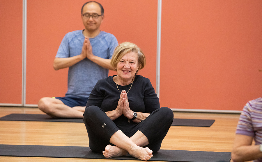 elderly doing yoga