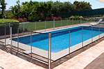 Swimming pool with fence